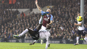 Adebayor brace sends Spurs third