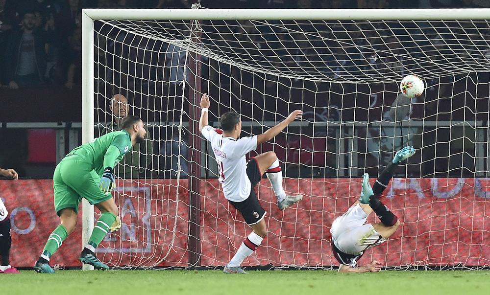 Andrea Belotti double downs AC Milan
