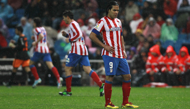 Atletico pair sent off in draw at Getafe