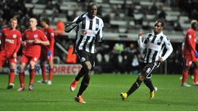 Ba brace helps Newcastle beat 10-man Wigan