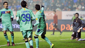 Barca beat Osasuna to set up Real showdown