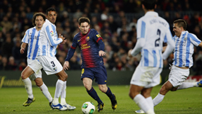 Barca held to 2-2 draw by 10-man Malaga