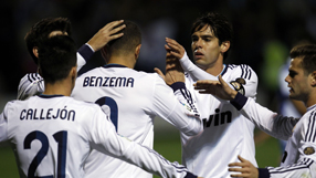 Benzema and Kaka steer Real to cup win