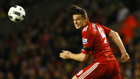 Carroll double helps Liverpool crush City