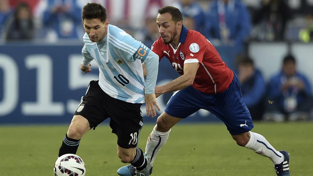 Chile 0 Argentina 0 (4-1 on penalties): Hosts end trophy drought