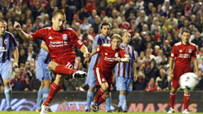 Liverpool win despite Cole penalty miss Liverpool win despite Cole penalty miss