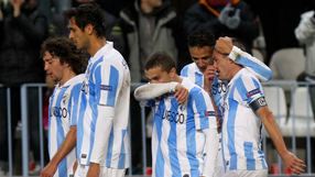 Malaga tighten grip on fourth with win at Sevilla