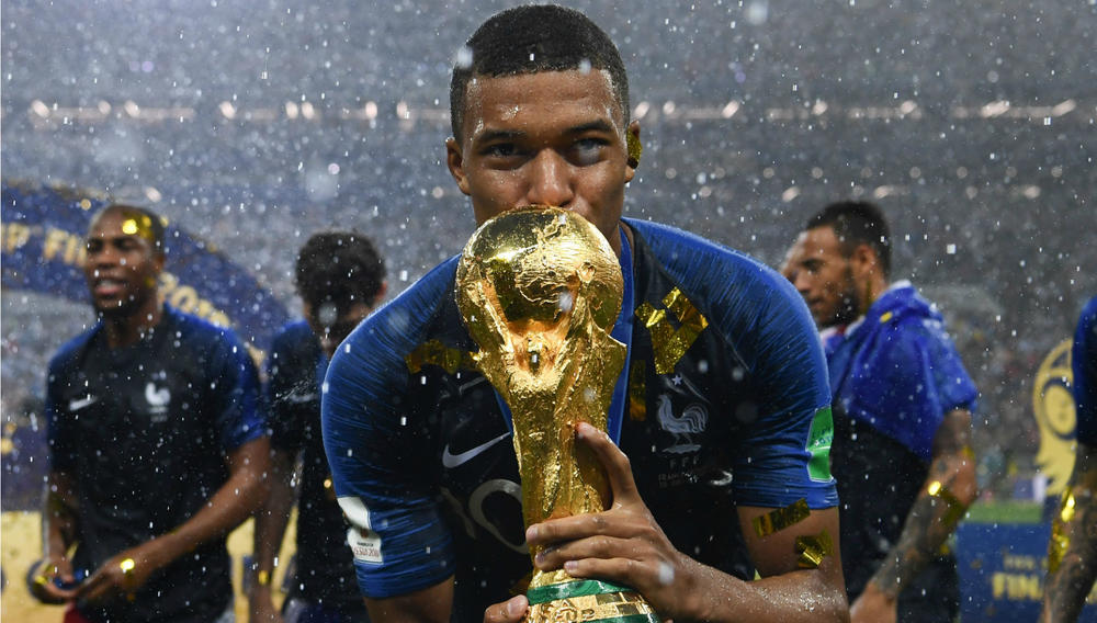 Mbappe shows off signed Pele shirt