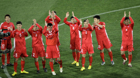 North Korea beaten but unbowed in opener