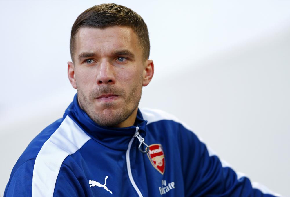 Podolski arrives in Milan for Inter discussions