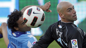 Real Madrid go through after goalkeeper gaffe