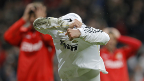 Real go top after Barca slip up