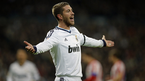 Real survive Ramos red to see off Rayo