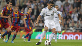 Ronaldo penalty rescues point against Barca