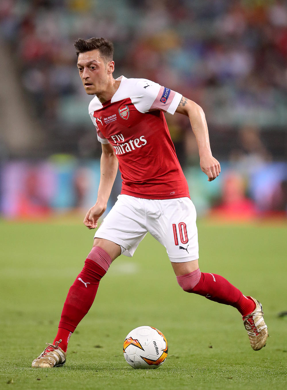 Two men charged over a security incident in connection with Arsenal duo