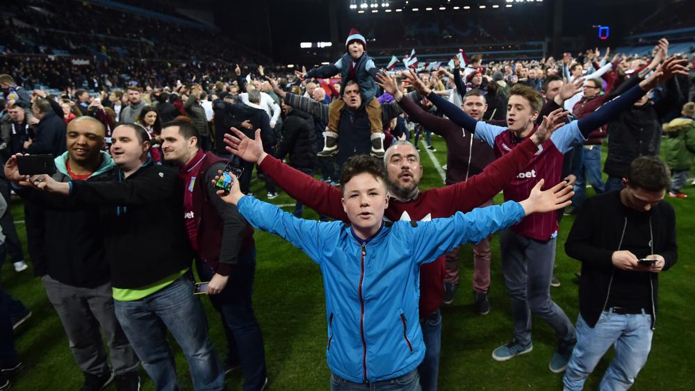 Villa issue apology following pitch invasion
